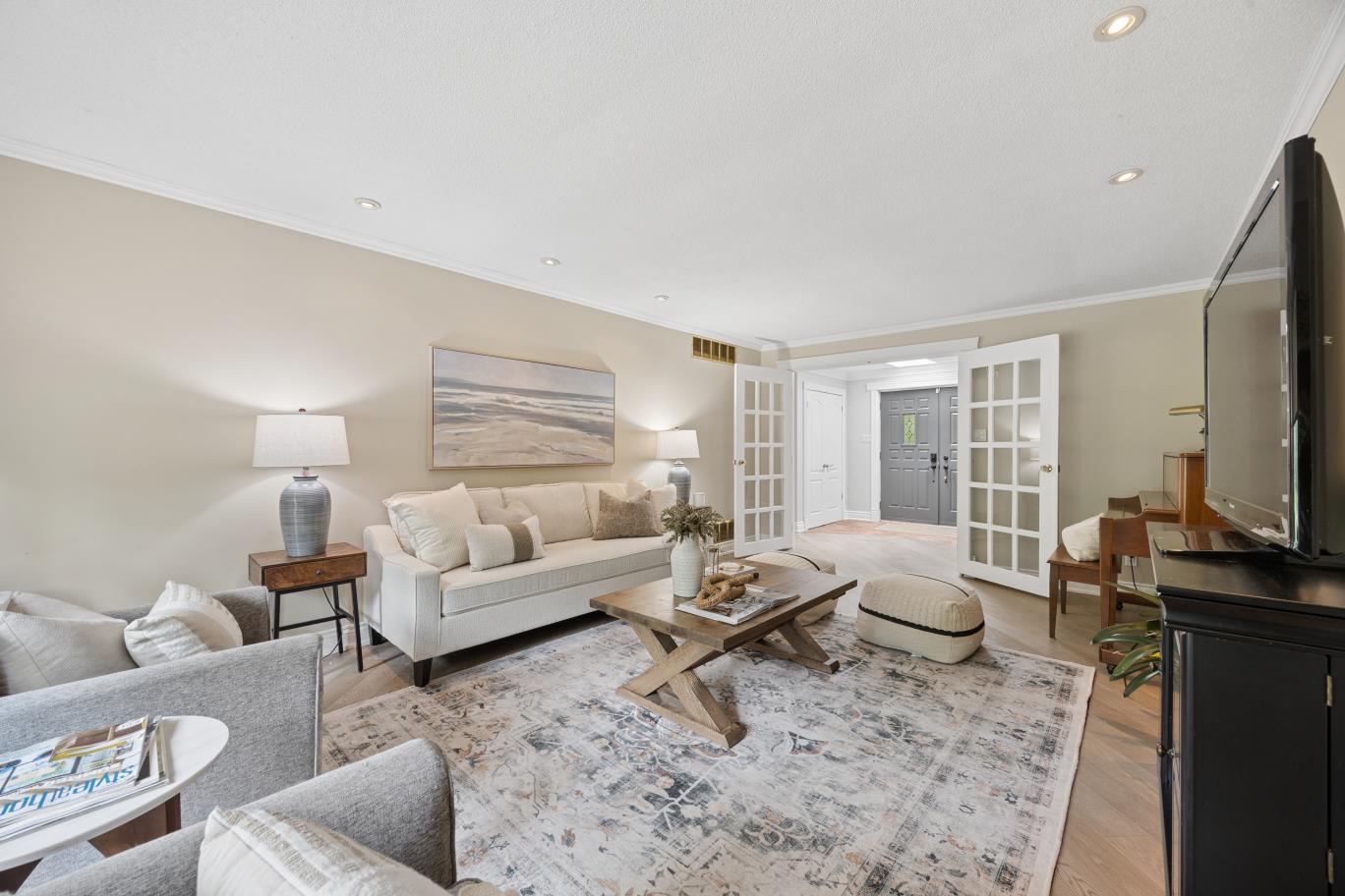 Staged living room seating area at 30 Potters Lane in Enniskillen, Clarington